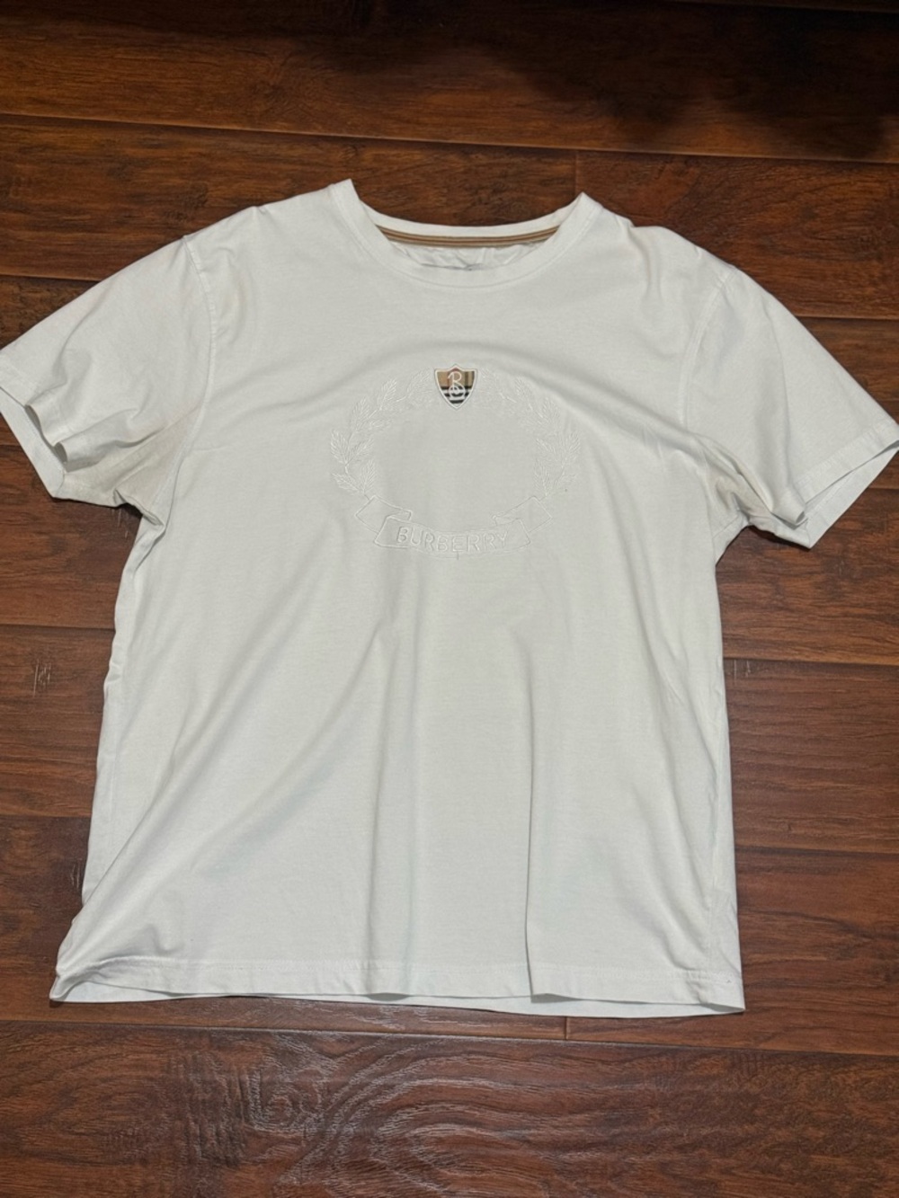 White Crew Neck Men's T-Shirt with Subtle Embossed Crest